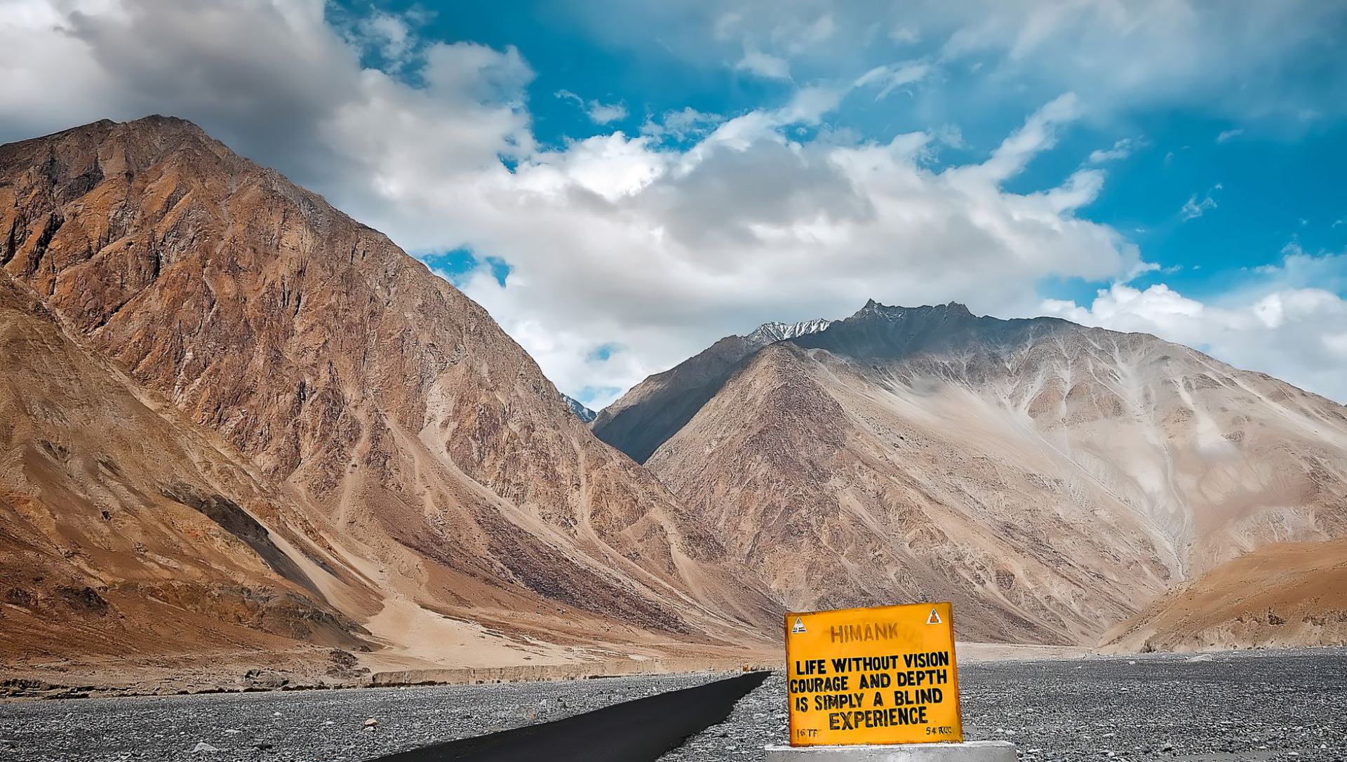 Magnetic Hill road and barren mountains near Leh